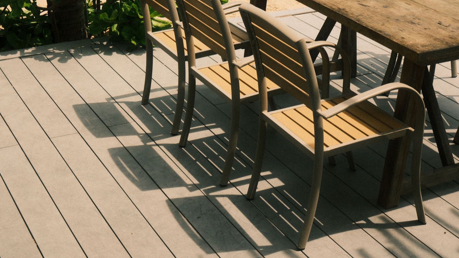 Composite deck with dark railing on a Saginaw, Michigan home at dusk
